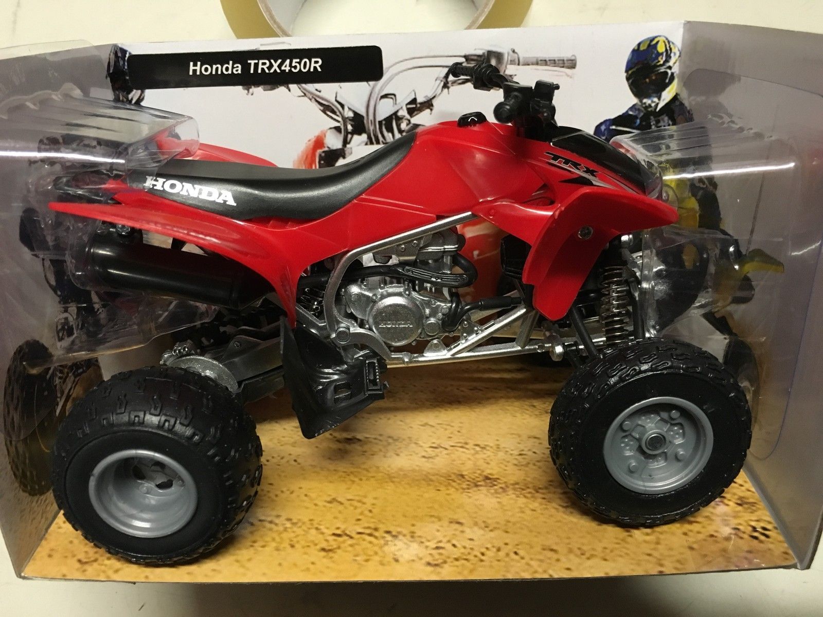 Quad miniature New Ray Honda 450 TRX 2009 red 1/12° - Accessoire & Stand  sur La Bécanerie