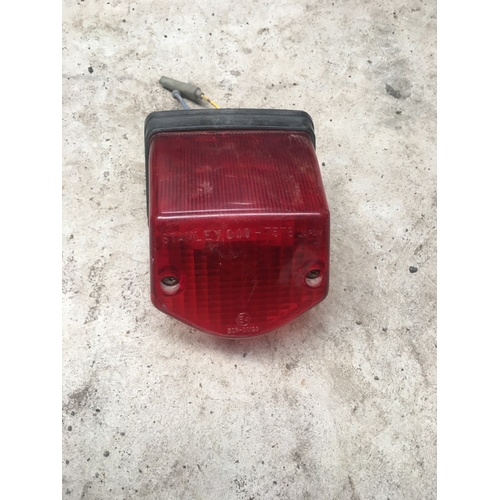 WRECKING YAMAHA DT 175 XT 350 THIS LISTING IS FOR THE USED REAR TAIL BRAKE LIGHT 
