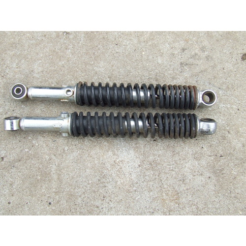 HONDA CT 110 POSTIE REAR SHOCKS - SUSPENSION  WORN . MARKS ON SHAFTS